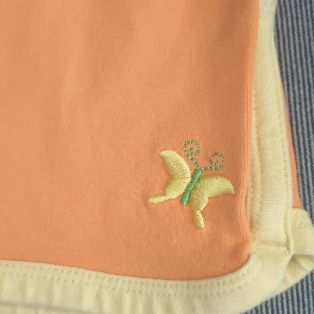 Girls athletic works shorts size 5t. Orange and yellow